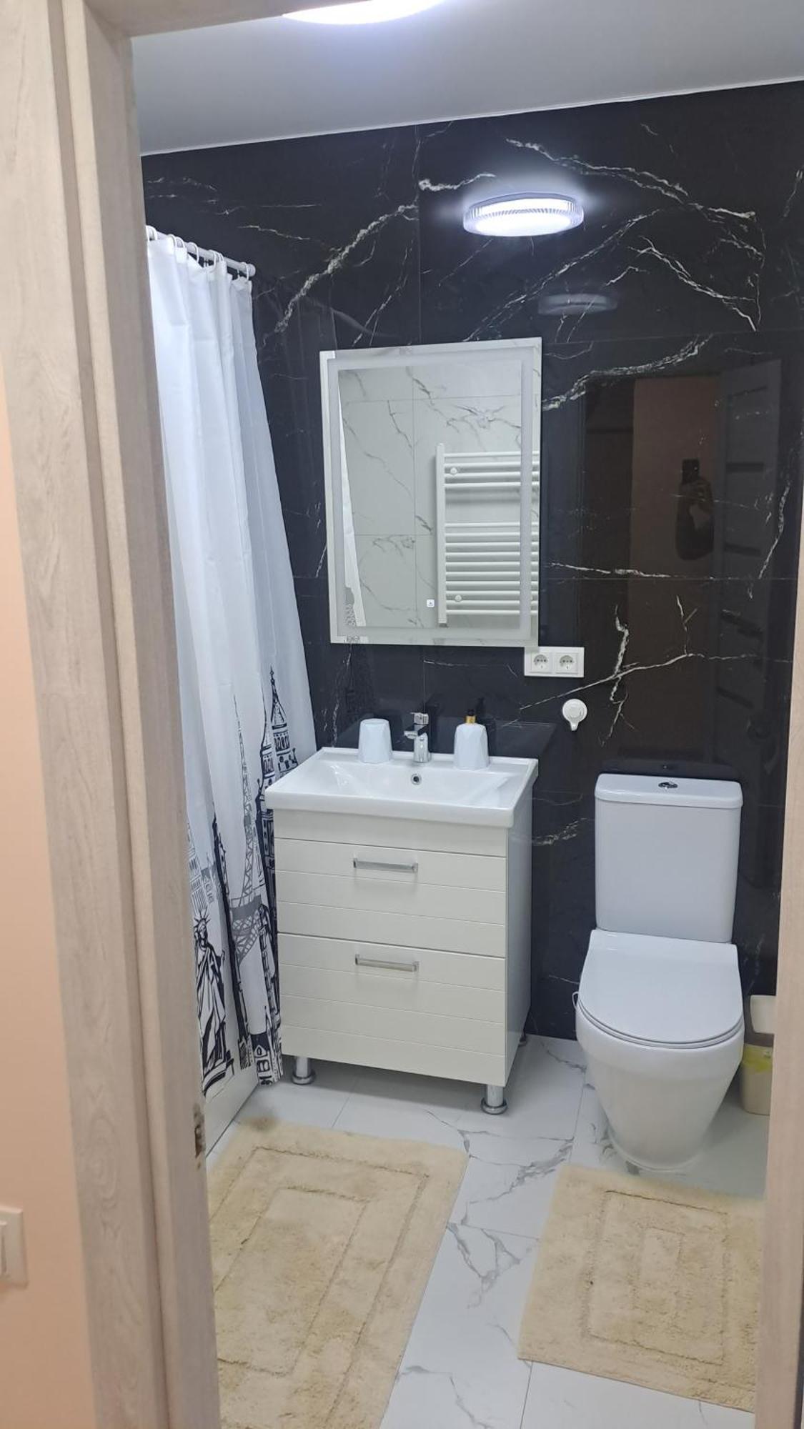 Аэропорт Апартаменты 24&24 キシナウ 部屋 写真